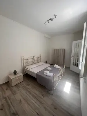 Letto o letti in una camera di L Ancora di Ortigia