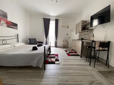 Letto o letti in una camera di L Ancora di Ortigia