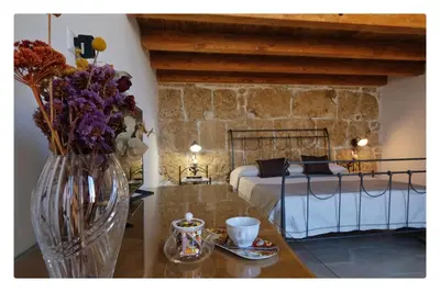 Letto o letti in una camera di Morfeo Charming Rooms & Relax