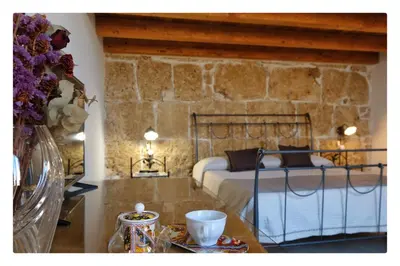 Letto o letti in una camera di Morfeo Charming Rooms & Relax