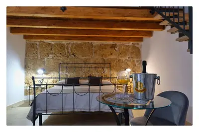 Letto o letti in una camera di Morfeo Charming Rooms & Relax