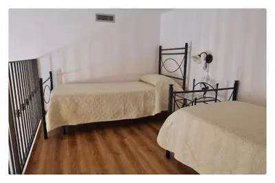 Letto o letti in una camera di Morfeo Charming Rooms & Relax