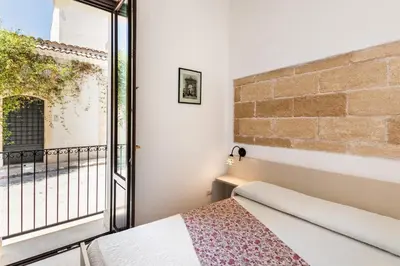 Letto o letti in una camera di Morfeo Charming Rooms & Relax