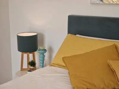 Letto o letti in una camera di Villa Elisia - villetta con piscina privata