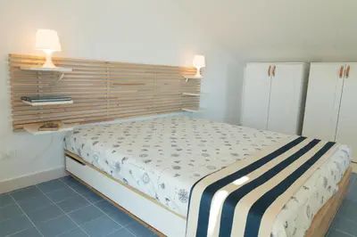 Letto o letti in una camera di Vela Bianca Marzamemi