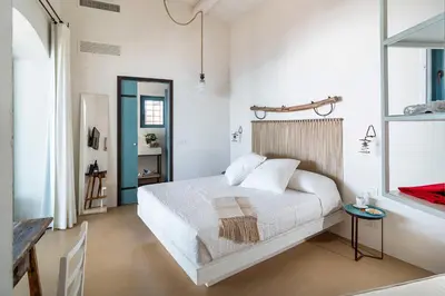 Letto o letti in una camera di Dimora di Circe