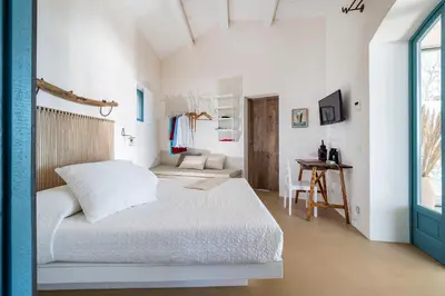 Letto o letti in una camera di Dimora di Circe