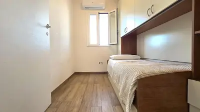 Letto o letti in una camera di Casa Marispica
