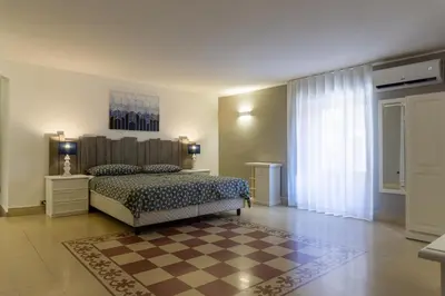 Letto o letti in una camera di Mi Tú Apartments