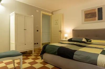 Letto o letti in una camera di Mi Tú Apartments