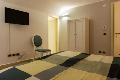 Letto o letti in una camera di Mi Tú Apartments