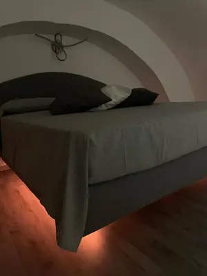 Letto o letti in una camera di Opificio Apartment