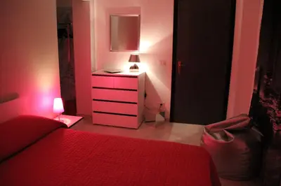 Letto o letti in una camera di Camere Amarzè Plus