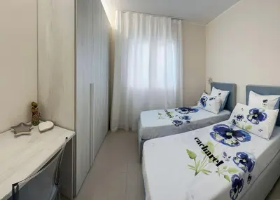 Letto o letti in una camera di Taormina 10 PANTA REI Fontane Bianche