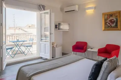 Letto o letti in una camera di Palazzo Gilistro
