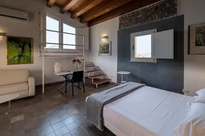 Letto o letti in una camera di Palazzo Gilistro