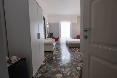 Letto o letti in una camera di Palazzo Gilistro