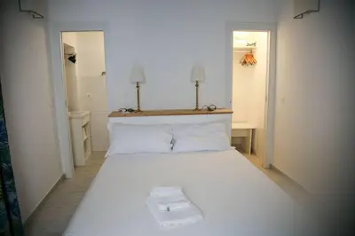 Letto o letti in una camera di Lanterne Magiche Ortigia - Dependances
