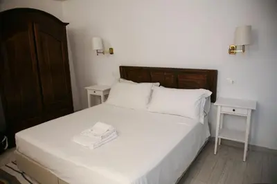 Letto o letti in una camera di Lanterne Magiche Ortigia - Dependances