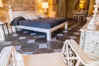 Letto o letti in una camera di Modica Luxury Palace