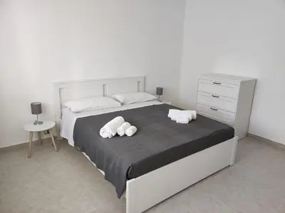 Letto o letti in una camera di E&S Apartment