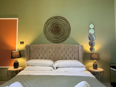 Letto o letti in una camera di Panorama Suites Noto - Adults Only