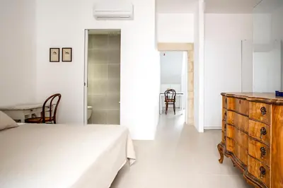 Letto o letti in una camera di Mazzini 5