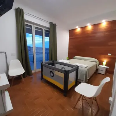 Letto o letti in una camera di L'Attico di Matilde
