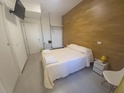 Letto o letti in una camera di L'Attico di Matilde