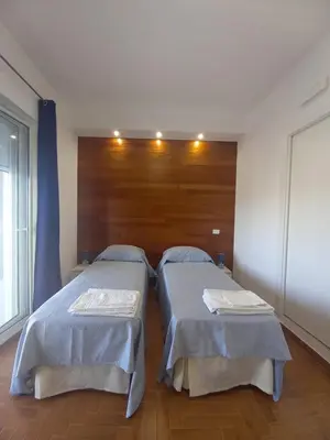 Letto o letti in una camera di L'Attico di Matilde