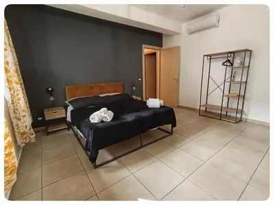 Letto o letti in una camera di Domeanto home