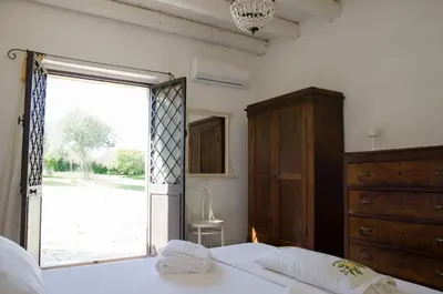 Letto o letti in una camera di Casa Degli Aromi, San Lorenzo, Noto