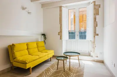 Area soggiorno di Giudecca Apartments by Wonderful Italy