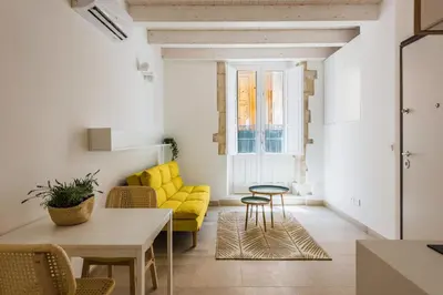 Area soggiorno di Giudecca Apartments by Wonderful Italy