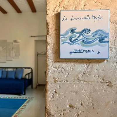 Letto o letti in una camera di La Dimora delle Ninfe