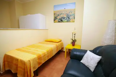 Area soggiorno di Catania Apartment Liotro