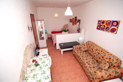 Area soggiorno di Catania Apartment Liotro