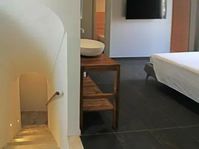 Letto o letti in una camera di Casa Mercè