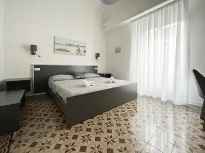 Letto o letti in una camera di Nove Volte B&B
