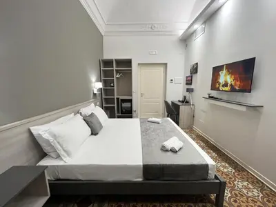 Letto o letti in una camera di Nove Volte B&B