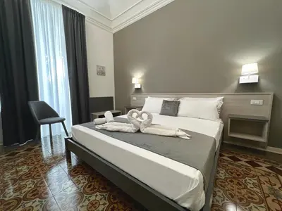 Letto o letti in una camera di Nove Volte B&B