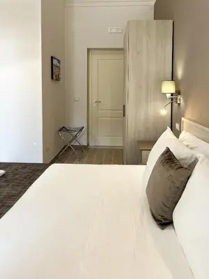 Letto o letti in una camera di Nove Volte B&B