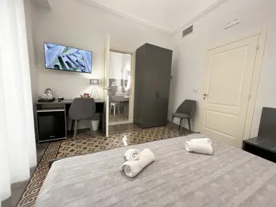 Letto o letti in una camera di Nove Volte B&B