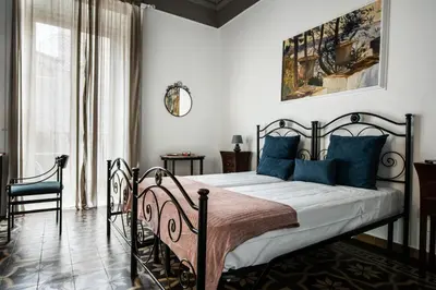Letto o letti in una camera di Ciuriddia Home by Homes4Holidays