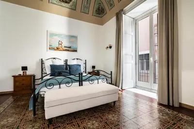 Letto o letti in una camera di Ciuriddia Home by Homes4Holidays