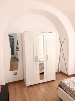 Letto o letti in una camera di Casa Vacanza Ti Ospito io
