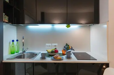 Cucina o angolo cottura di GuestHost - Ortigia Studios - Charming Apartments