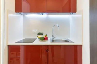 Cucina o angolo cottura di GuestHost - Ortigia Studios - Charming Apartments