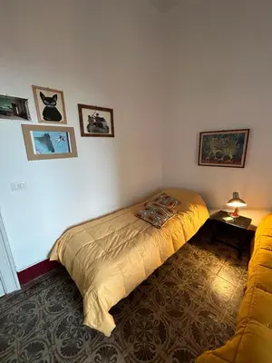 Letto o letti in una camera di Casa Kalù