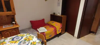 Letto o letti in una camera di Oasi Marina